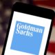 In this photo illustration the Goldman Sachs Group logo is displayed on a smartphone-Goldman Sachs Profits-ss-featured