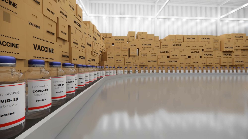 Vaccine bottles on the production line. Coronavirus vaccine has been certified and ready to injection-COVID-19 Vaccine Deliveries-ss-featured