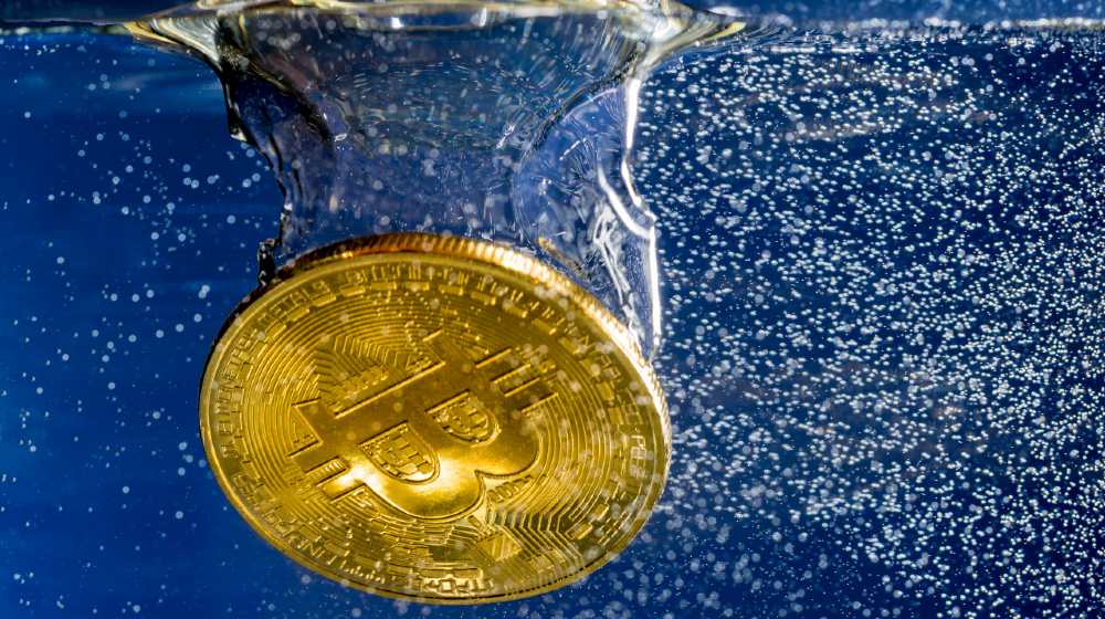 Bitcoin coin dropped into water-Bitcoin Plunge-SS-Featured