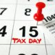 Calendar showing date April 15 2020 with 1040 form, tax day in USA-tax day-ss-featured