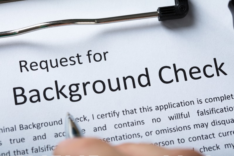High Angel View Of Criminal Background Check Application Form With Pen-bakcground check-ss