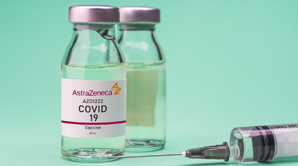 New vaccine AstraZeneca isolated on green background-AstraZeneca COVID-19 Vaccine-ss-featured