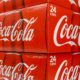Cases of Coca Cola on display on a grocery store shelf-boycott coke-ss-featured