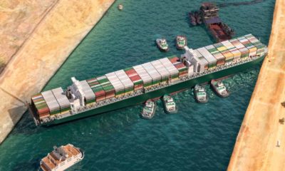 Ever given has been freed in Suez Canal. Effort to refloat vast wedged container cargo ship by tug boats, dredger-Evergreen Stock | Evergreen Stock Up 28% After Their Ship Blocked Suez Canal | Featured