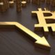 Golden bitcoin symbol and arrow down | After Hitting $63K, Bitcoin Prices Fell 19% Over The Weekend | Featured