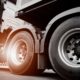 Truck transportation, close up wheel of semi truck-Dent Tires-ss-featured