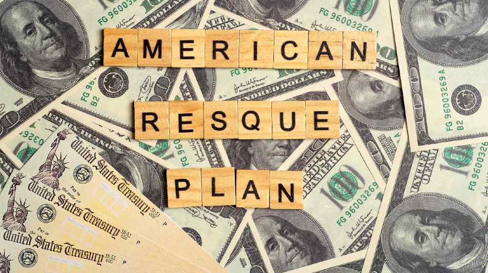 USA dollars background. American rescue plan, USA relief program, stimulus check and Act of 2021 | Is the Government Planning Another Stimulus Payment | featured