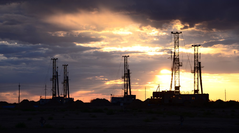the drilling rigs against a sun dawn-uranium-ss-featured