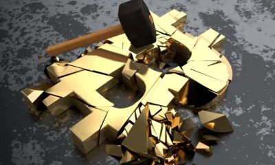 Golden bitcoin symbol cryptocurrency broken with a hammer into many pieces. The idea of a cryptocurrency crisis of the financial system collapse, inflation bitcoin.-Cryptocurrency prices-SS-Featured