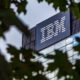 The IBM logo is seen on the top of the IBM GDC Romania headquarter building | IBM Retirement Fund Reduces Stock Position | Featured