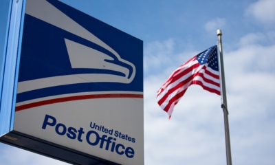 United State Postal Service sign with American Flag-US Postal Service-SS-Featured