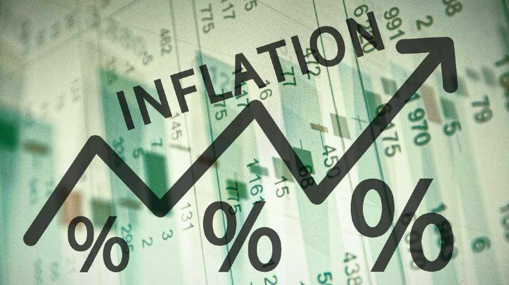 Word Inflation on up trend arrow, with financial data visible on the background | Inflation Explained | Featured