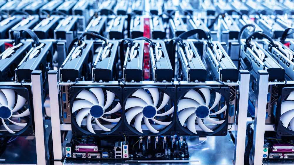 Bitcoin mining farm. IT hardware. Electronic devices with fans | Bitcoin Miners Booted By China, Texas Likely Destination | featured