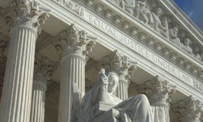 Equal Justice Under Law engraving above entrance to US Supreme Court Building | High court backs businesses challenging California labor law | featured