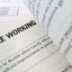 Flexible working word on the book with balance sheet as background | Employers, it's time to embrace flexibility | featured