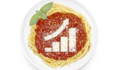 Freshly cooked dish of tasty pasta with tomato sauce and parmesan cheese in the shape of a growing bar chart | Restaurant Prices Rise Amid Inflation, Labor Shortage | Featured