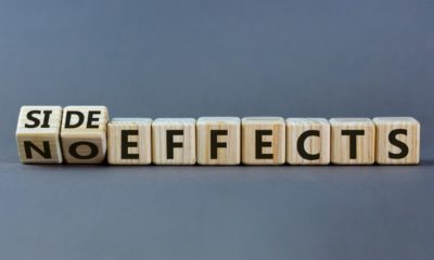 Side or no effects symbol. Turned wooden cubes and changed words 'no effects' to 'side effects' | FDA To Add Heart Warning To Pfizer, Moderna Vaccines | featured