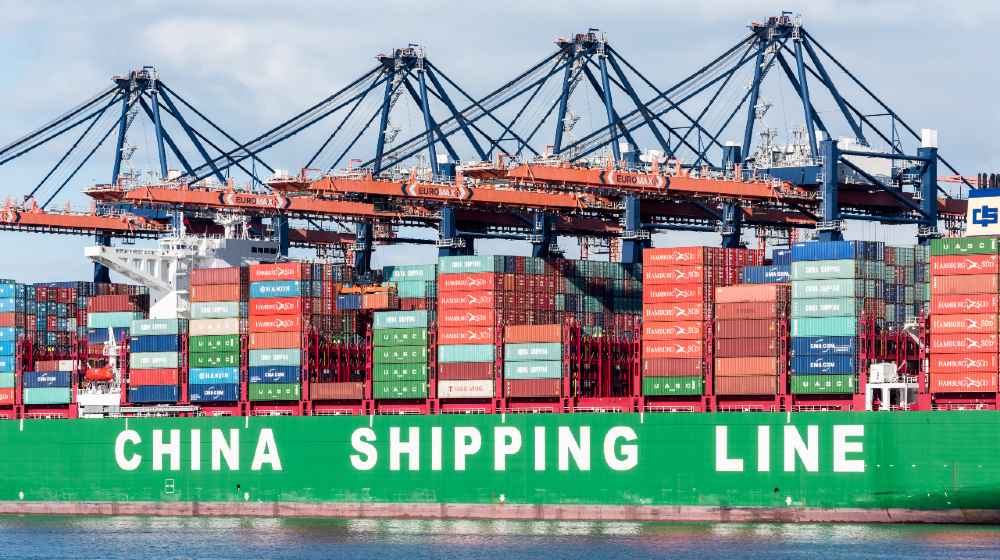 The ultra large container ship CSCL Indian Ocean of the China Shipping Line moored | Shipping Crisis Looms With COVID-19 Outbreak In Southern China | featured