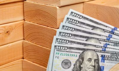 Construction lumber with cash money. Building materials price increase | The Lumber Bubble Burst As Prices Go Down 40% | featured
