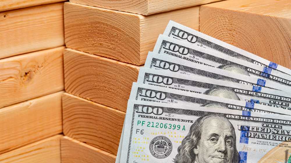 Construction lumber with cash money. Building materials price increase | The Lumber Bubble Burst As Prices Go Down 40% | featured