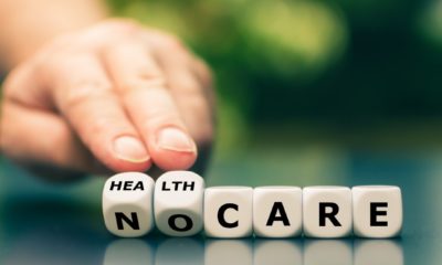 Hand turns dice and changes the expression no care to health care | Hospitals Charge Higher Rates To Uninsured Patients | featured