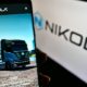 Person holding mobile phone with web page of US electric vehicle company Nikola Corp | Nikola Founder Trevor Milton Indicted On Fraud Charges | featured