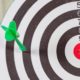 ATTACHMENT DETAILS dart-arrow-missed-in-the-target-center-of-dartboard | Biden Declares Success Even As US Misses Vaccine Goal | featured