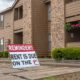 Despite the covid 19 pandemic shutdown, a sign in the parking lot of an apartment complex reminds renters that Rent is due on the 1st | Supreme Court Rejects Biden’s New Eviction Moratorium | featured