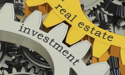 real estate investment concept on the gearwheels | 10 Mistakes That Keep You From Getting RICH In Real Estate Investing | featured