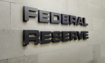A building signage that says 'Federal Reserve' | Federal Reserve Now Says Inflation Longer Than Expected | featured