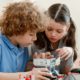 Boy and girl working together on a robotics project | Sparkle Box Breaks the Boundaries of Learning with its Educational Kits | featured