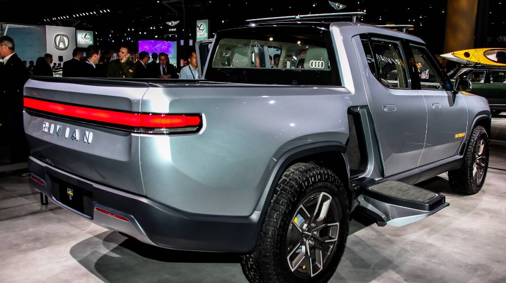 Rivian R1T Pickup truck is an all electric vehicle shown at the New York International Auto Show 2019 | Rivian Beats Tesla, GM and Ford, Releases First EV Pickup | featured