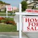 Row of Foreclosure Home For Sale Real Estate Signs in Front of Houses | US Housing Crisis Worsens, Market Short by 5 Million Homes | featured