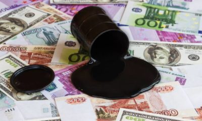 Spilled oil barrel on money bills of different countries | Crude Oil Forecast and Technical Analysis | featured