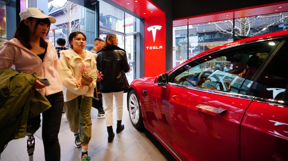 Tesla car model showroom located in the largest shopping mall in Chengdu | Elon Musk Hails China, Says Tesla Investments Will Continue | featured