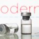 Vials and syringe with Moderna Inc logo | Moderna Working On A Combination COVID and Flu 2-in-1 Vaccine | featured