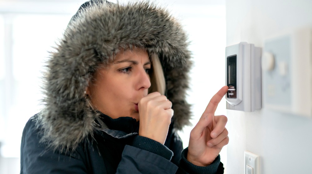 Woman With Warm Clothing Feeling The Cold Inside House-Natural Gas-SS-Featured