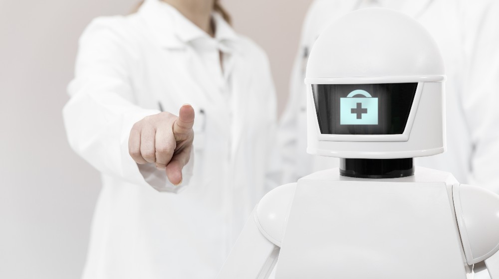 nursing care robot in a hospital or surgeon with copyspace | Doctors to send robot in to assess patients in care homes | featured