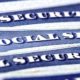 Closeup detail of several Social Security Cards representing finances and retirement | Social Security To Raise Benefits By 5.9% Starting Next Year | featured