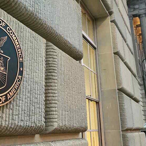 DEPARTMENT OF COMMERCE sign seal emblem at headquarters building | Commerce Head Out to Save US Jobs, 1 Computer Chip at a Time | featured