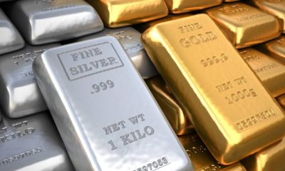 Silver ingot and gold bullion | Investing In Gold And Silver For Your Retirement | featured