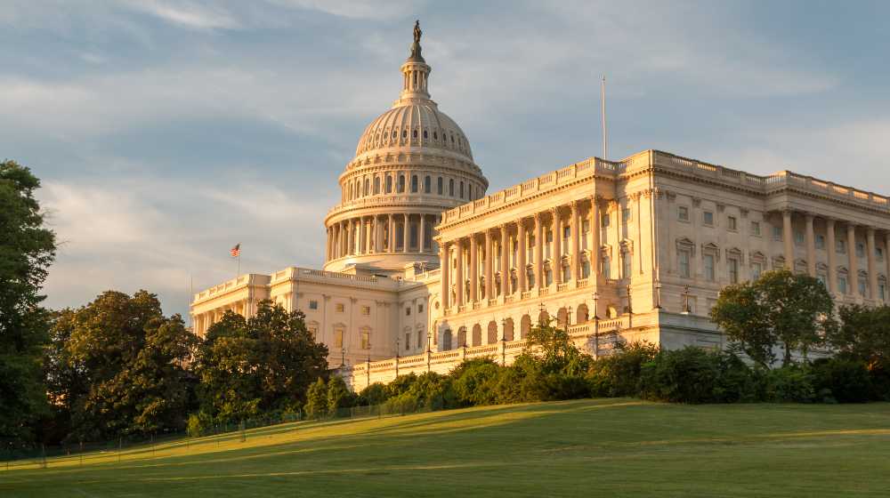 US Capitol and Green Lawn During Sunset | US House Concurs With Senate to Raise Debt Ceiling | featured
