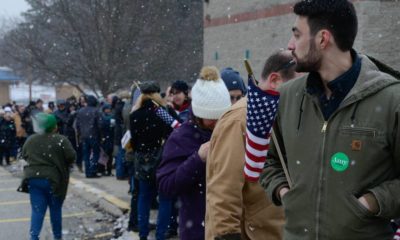 A long line of voters waits to get into Sen. Amy Klobuchar's town hall | Voters have a problem with authority | featured