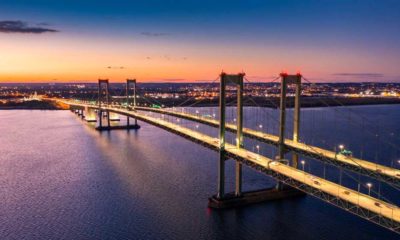 Aerial view of Delaware Memorial Bridge at dusk | House OKs $1T Infrastructure Deal, Wall Street Hits New Highs | featured