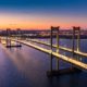 Aerial view of Delaware Memorial Bridge at dusk | House OKs $1T Infrastructure Deal, Wall Street Hits New Highs | featured