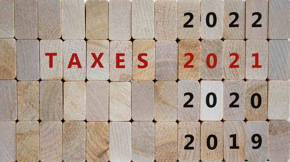 Business concept of planning 2021 | United States: Potential Tax Law Changes Hang Over Year-End Tax Planning For Individuals | featured