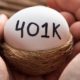 Closeup of hands holding 401K white egg in nest | What Is a 401k? | featured