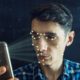 Man is trying to access the phone using the personal identification method of face recognition | Facebook To Shut Down Its Facial Recognition Program | featured