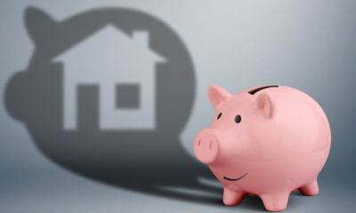 Pink piggy bank with shadow as home, savings for house finance concept | Total US Household Debt Reaches $15 Trillion For The 1st Time | featured