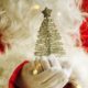 Santa Holding Christmas Tree | Supply Chain Crisis Makes Auto Firms Ditch Holiday Promos | featured